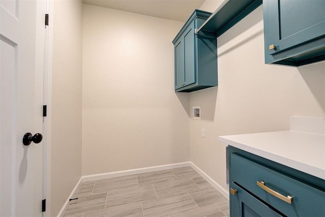 laundry room featuring cabinets and hookup for a washing machine