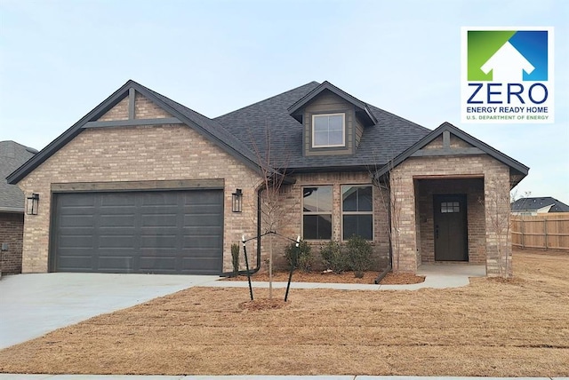 view of front of property with a garage