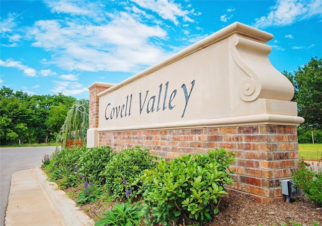 view of community sign