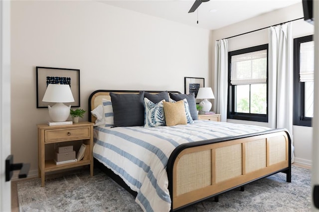 carpeted bedroom with ceiling fan