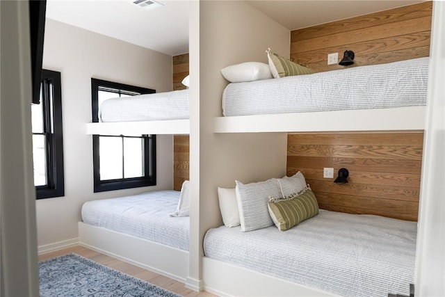 bedroom with light hardwood / wood-style flooring