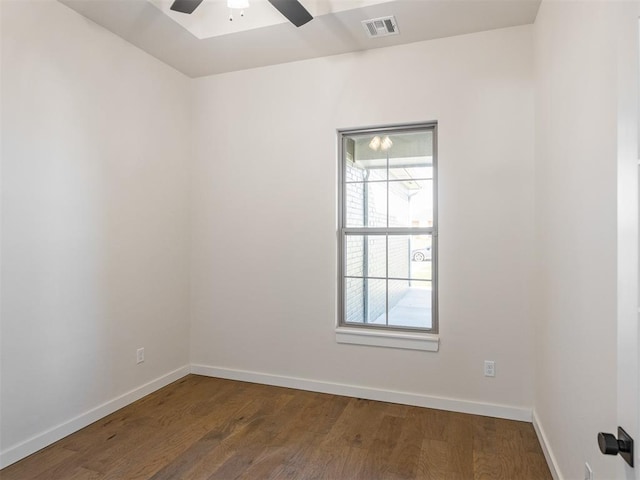 empty room featuring ceiling fan and wood-type flooring