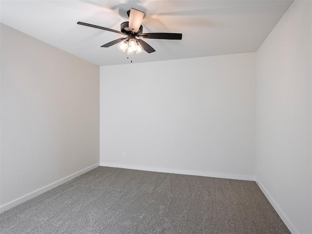 empty room with ceiling fan and carpet floors