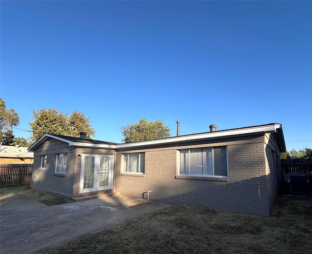 rear view of house with a patio