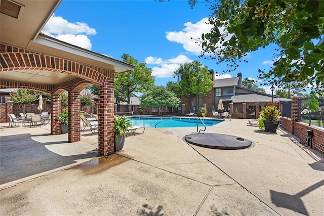 view of pool with a patio area