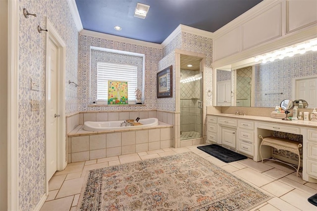 bathroom with tile patterned flooring, vanity, crown molding, and shower with separate bathtub