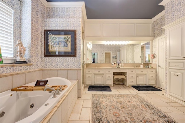 bathroom with a bathing tub, crown molding, and vanity