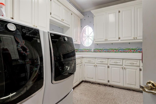 laundry room featuring cabinets, light carpet, washing machine and dryer, and ornamental molding