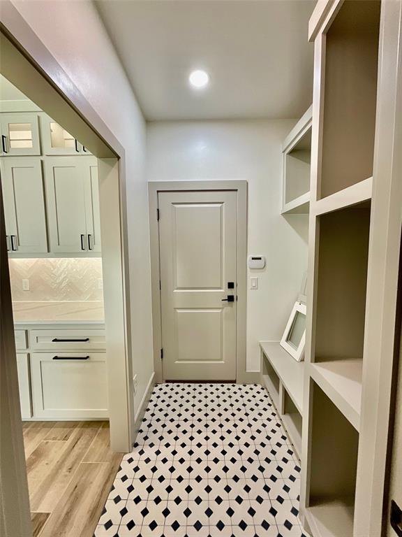 mudroom featuring light wood-type flooring