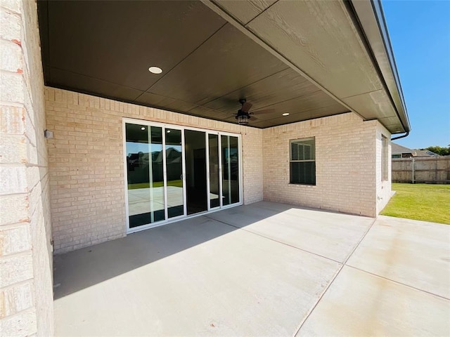 view of patio featuring ceiling fan