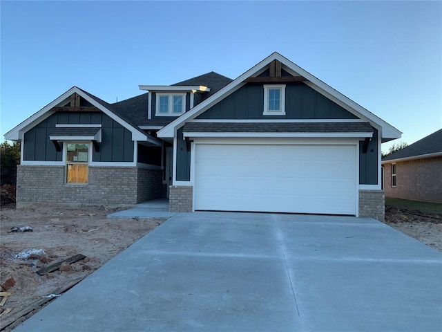 craftsman inspired home with a garage