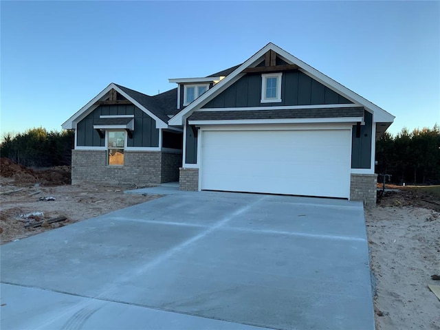 craftsman-style house featuring a garage