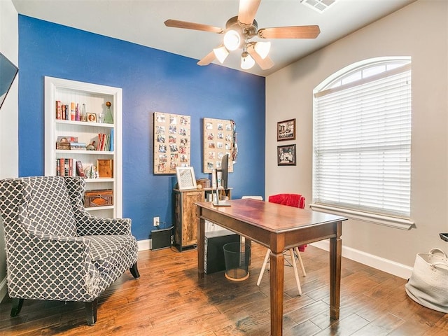 office space with ceiling fan and wood-type flooring