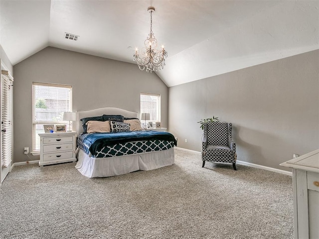 bedroom featuring carpet, vaulted ceiling, multiple windows, and a notable chandelier