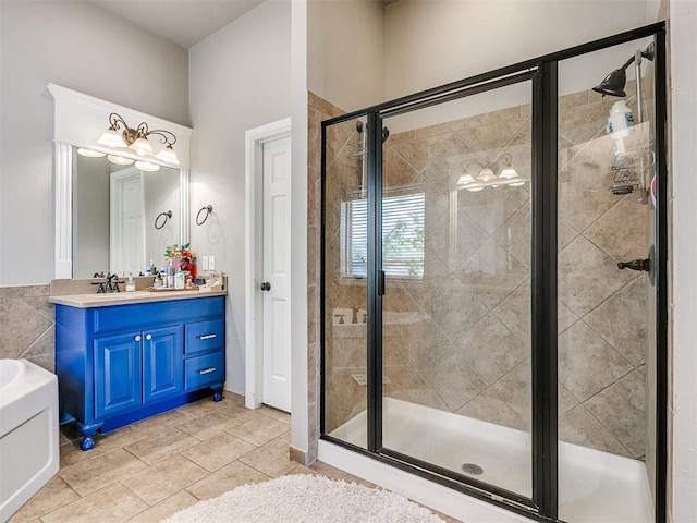 bathroom featuring vanity, tile patterned floors, and independent shower and bath