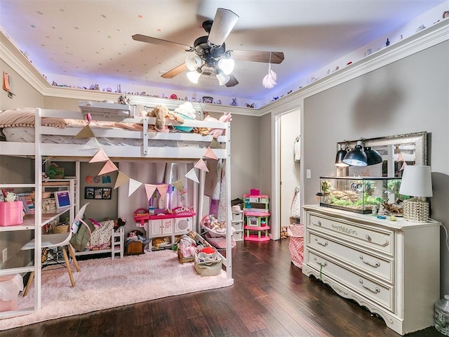 bedroom featuring crown molding, ceiling fan, and dark hardwood / wood-style floors