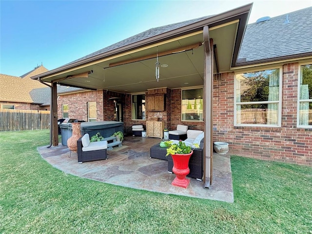 view of patio with a hot tub