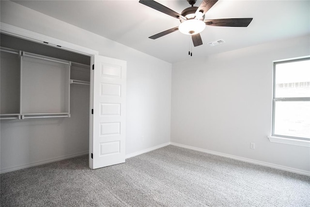 9317 Cheek Ranch Rd, Yukon, OK 73099 - unfurnished bedroom with ceiling fan, visible vents, baseboards, a closet, and carpet