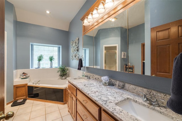 bathroom with separate shower and tub, tile patterned floors, and vanity