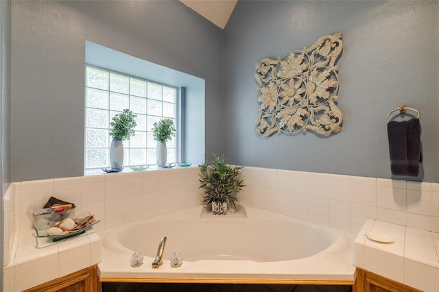 bathroom with a washtub