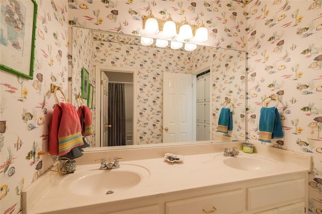 bathroom with a shower with curtain and vanity