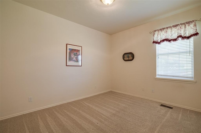 view of carpeted spare room