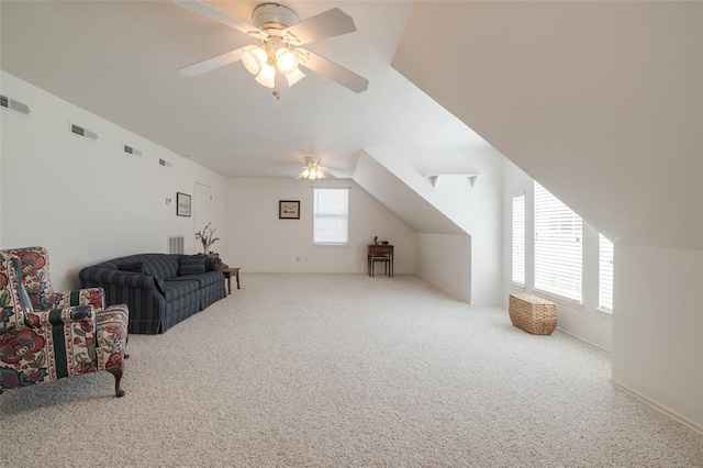 additional living space with ceiling fan, carpet floors, and vaulted ceiling