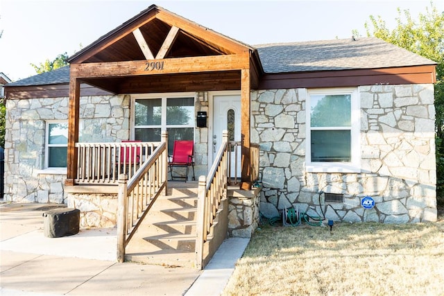 view of front of home featuring covered porch