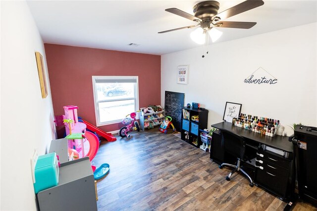 recreation room with hardwood / wood-style flooring and ceiling fan