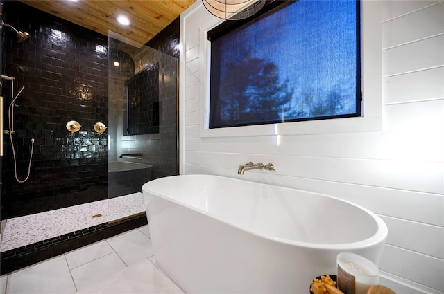 bathroom with shower with separate bathtub, tile patterned floors, and wood ceiling