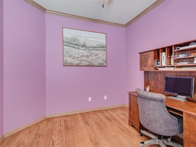 home office featuring light hardwood / wood-style flooring and ornamental molding