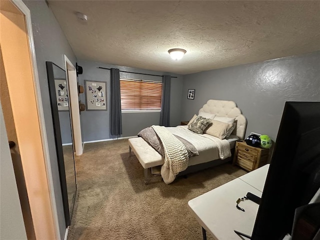 carpeted bedroom with a textured ceiling