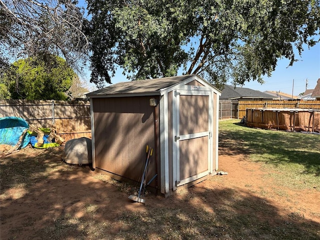 view of outdoor structure with a yard