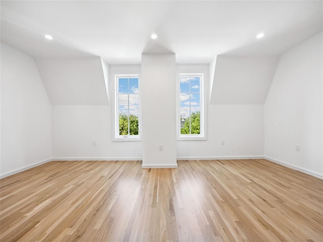 6100 NW Grand Blvd Unit 6105, Oklahoma City, OK 73118 - bonus room featuring baseboards, vaulted ceiling, light wood-type flooring, and recessed lighting