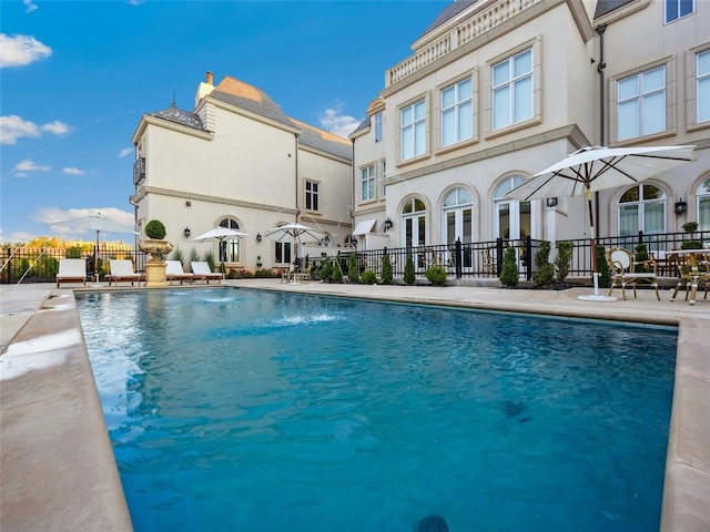 view of pool featuring pool water feature