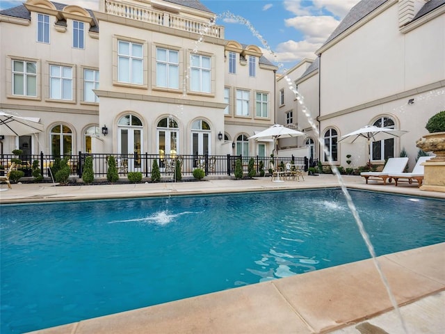 view of pool featuring pool water feature