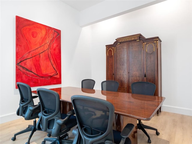 office space with light wood-type flooring