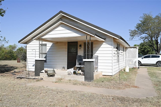 bungalow-style home with covered porch