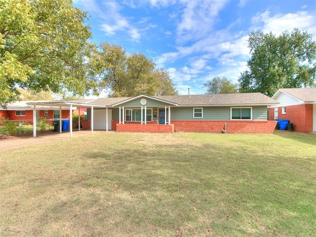 ranch-style house featuring a carport, covered porch, and a front yard