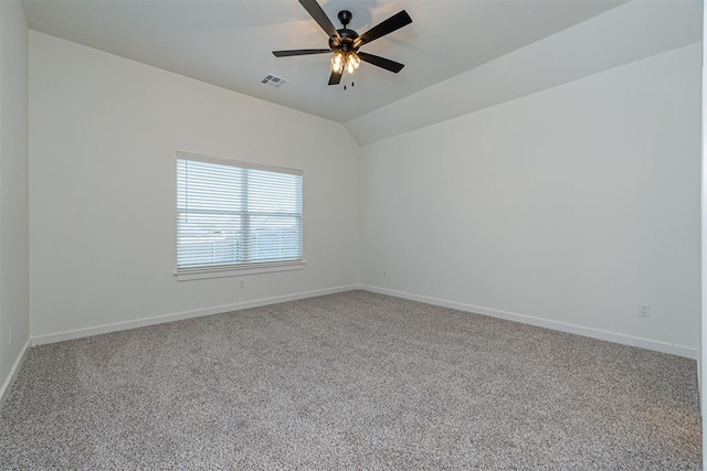 11601 SW 58th St, Mustang, OK 73064 - carpeted empty room with baseboards, ceiling fan, and vaulted ceiling