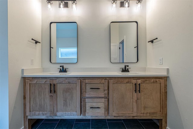 11601 SW 58th St, Mustang, OK 73064 - full bathroom with double vanity, tile patterned floors, and baseboards