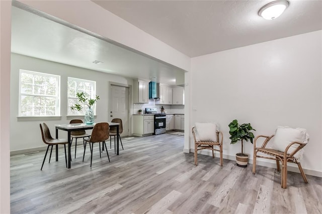 dining area featuring light hardwood / wood-style flooring