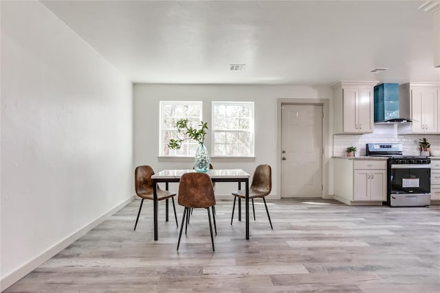 dining room featuring light wood-type flooring