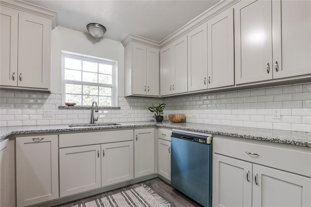 kitchen with backsplash, stainless steel dishwasher, dark wood-type flooring, and sink