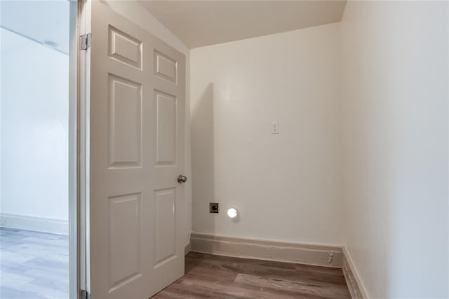 washroom featuring hookup for an electric dryer and hardwood / wood-style flooring