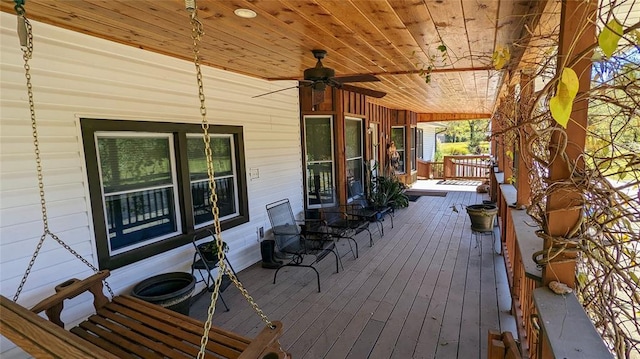 deck featuring ceiling fan and covered porch