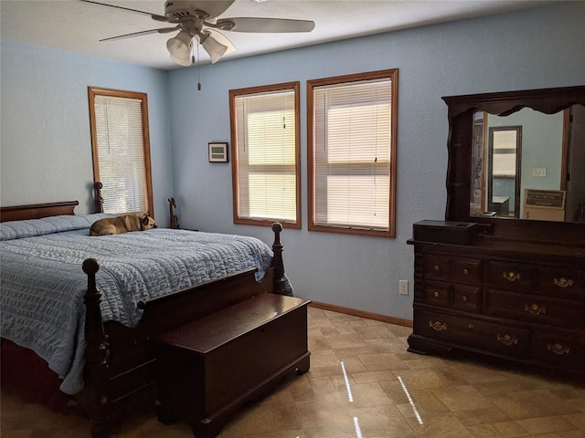 bedroom featuring ceiling fan