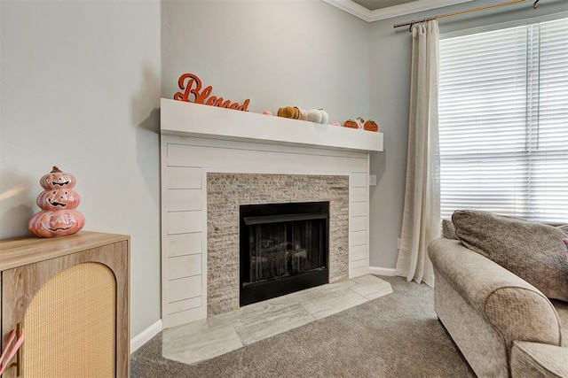 carpeted living room with crown molding