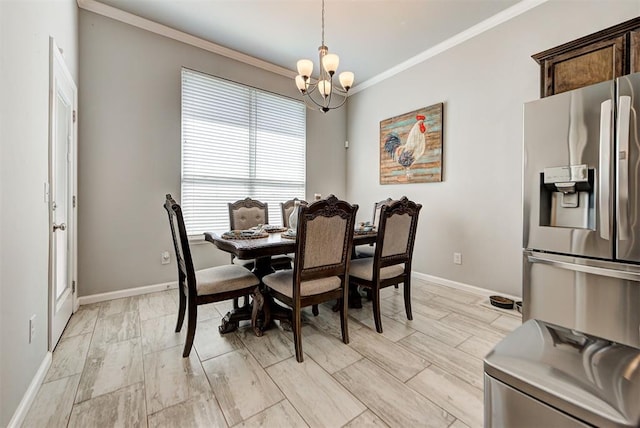 dining area with a notable chandelier, light wood-type flooring, and crown molding