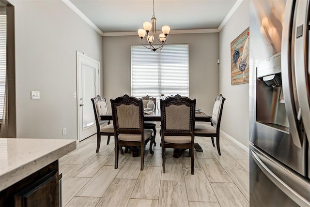 dining room featuring crown molding and a notable chandelier